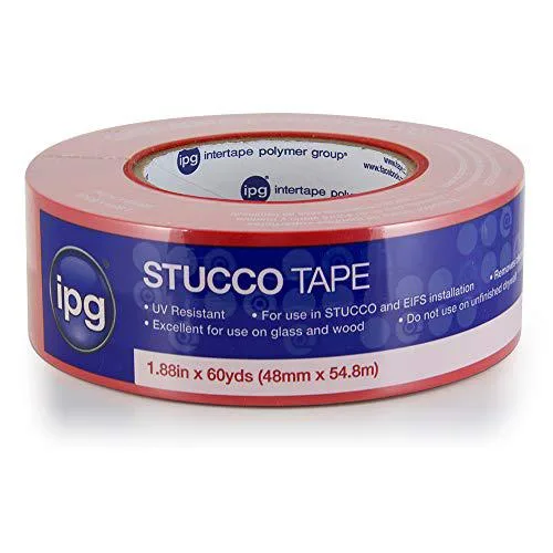 White masking tape roll with red poly backing on a cardboard core