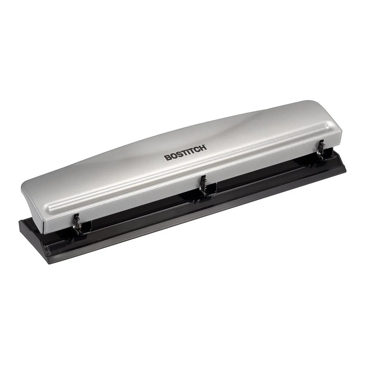 Silver metal three-hole punch with rubber base and open chip tray