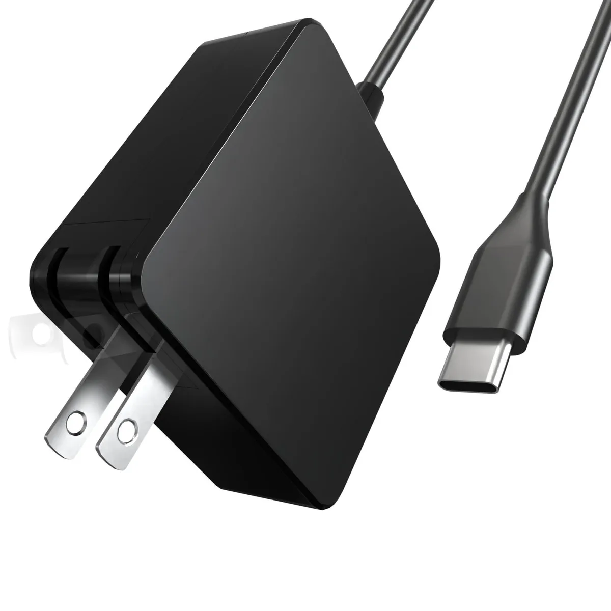 Compact black USB-C power brick with foldable wall prongs and attached cable