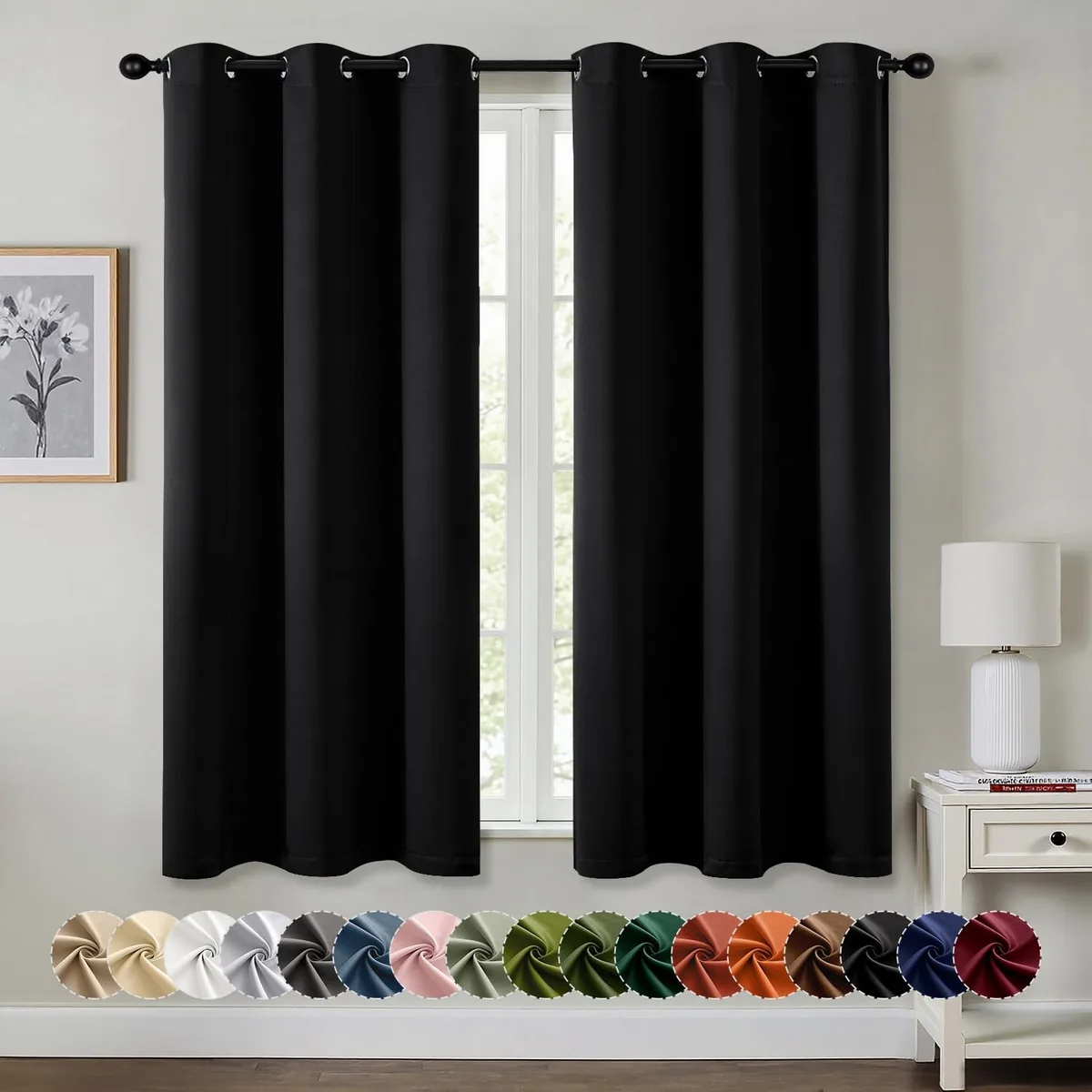 Two black fabric curtain panels with silver grommets, each 40 by 63 inches