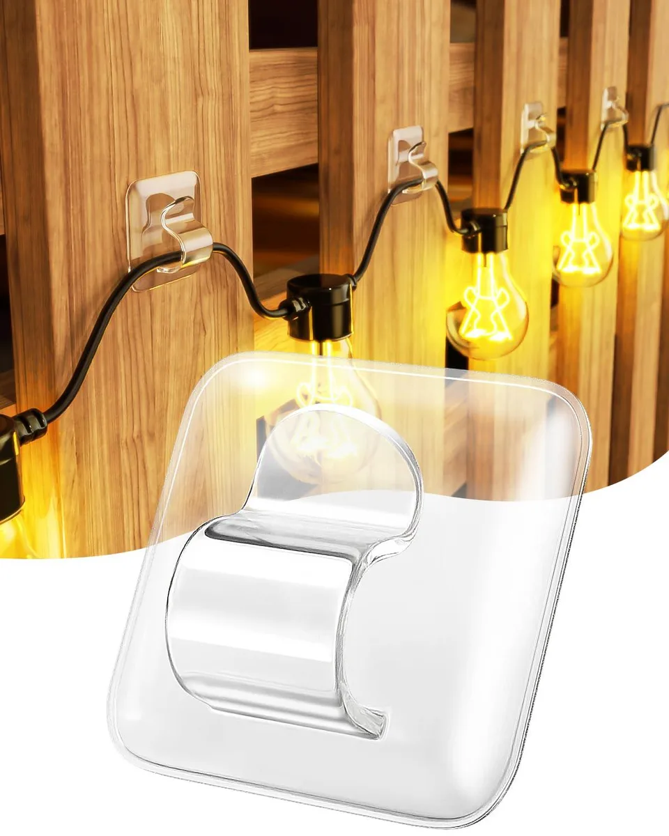 A pack of 25 clear square adhesive hooks for outdoor string lights