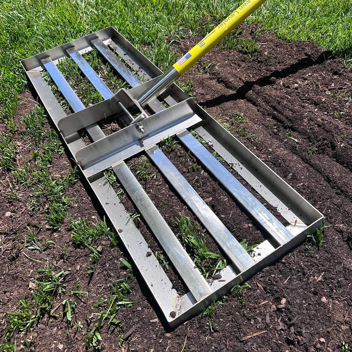 Stainless steel lawn leveling rake with 30 by 10 inch plate and 78 inch handle