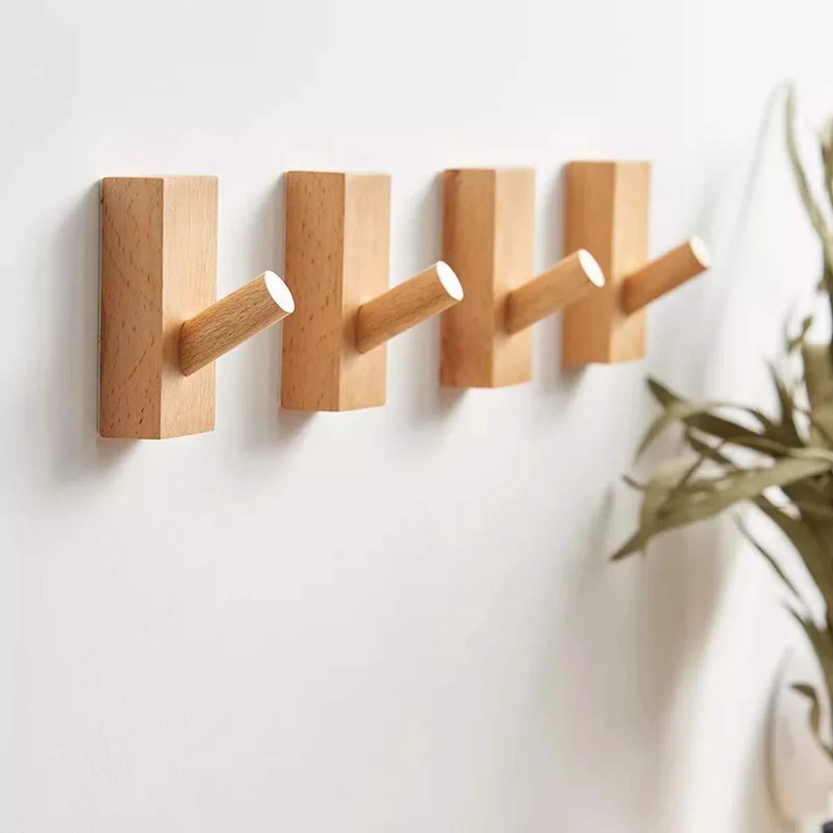 Four rectangular beech wood wall hooks with adhesive backing