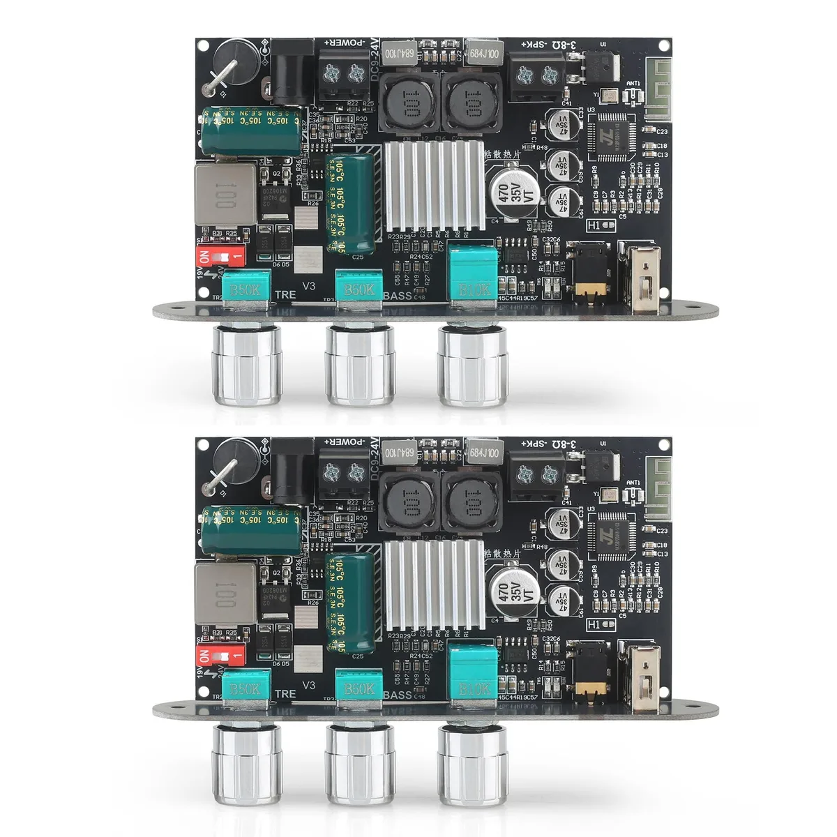Green rectangular circuit board with silver components and three black knobs