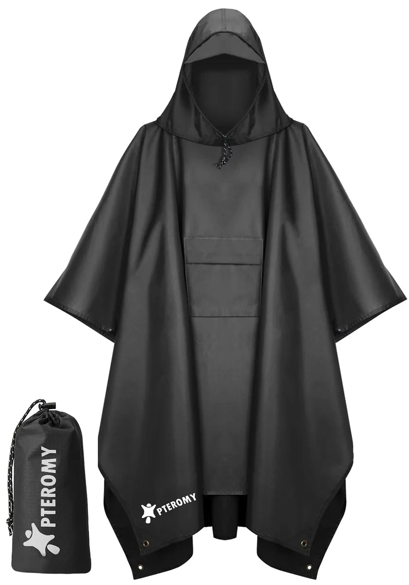 Black hooded rain poncho made of lightweight polyester, packed in a compact storage pouch