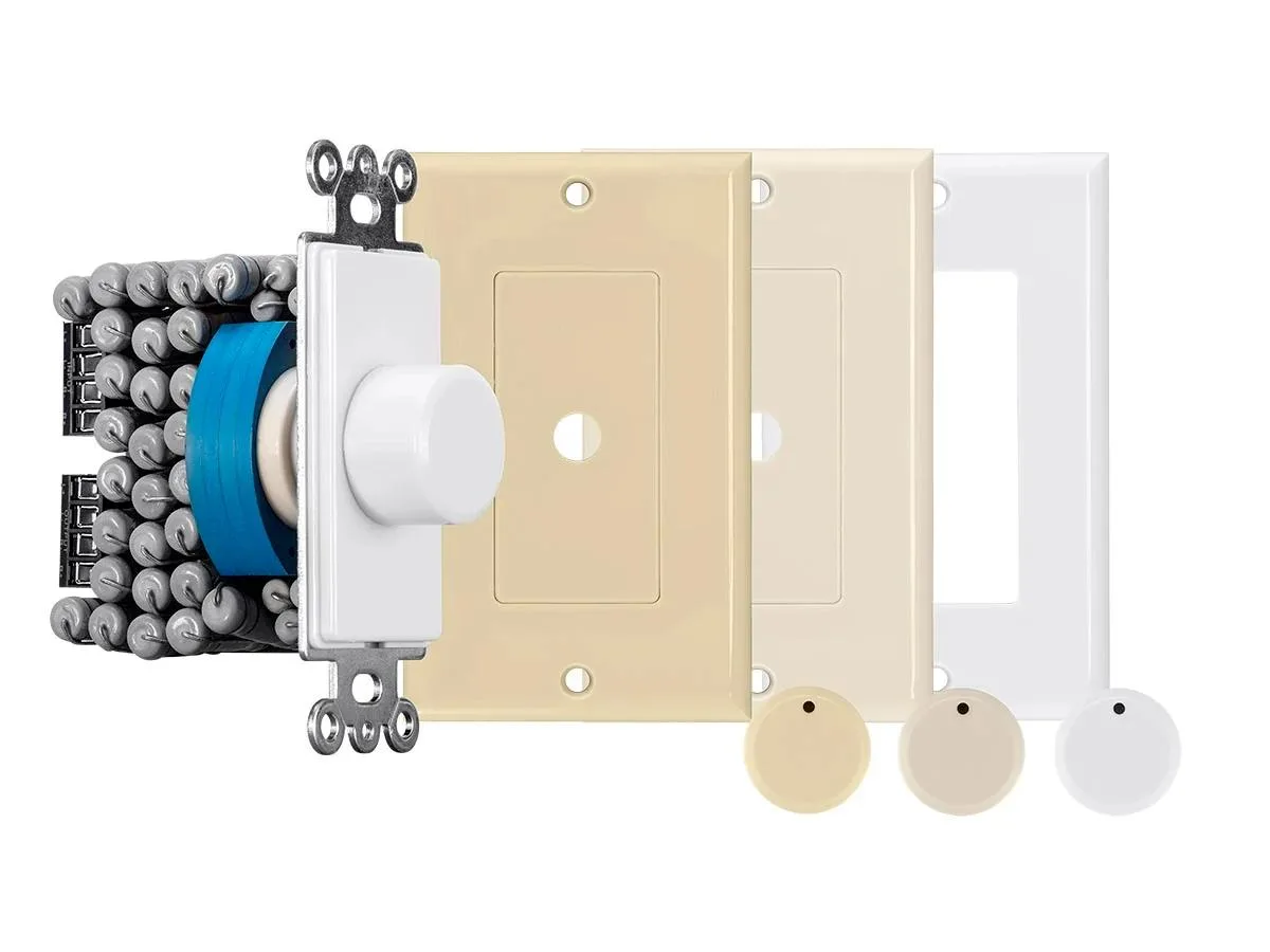 White rotary speaker volume control with almond and ivory knob inserts, color-coded solderless terminals visible on the back