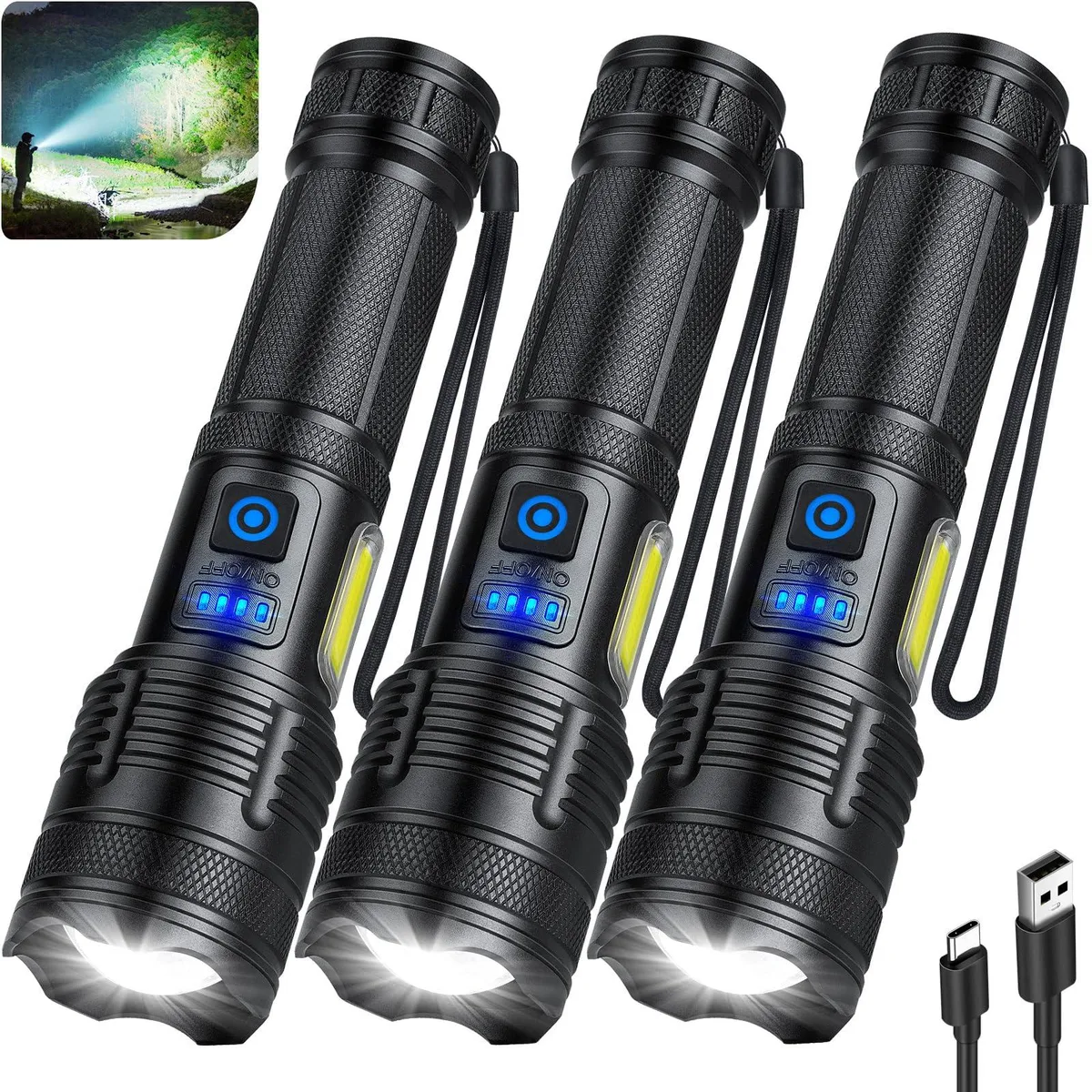 Three black aluminium flashlights with adjustable heads and power indicators lying side by side