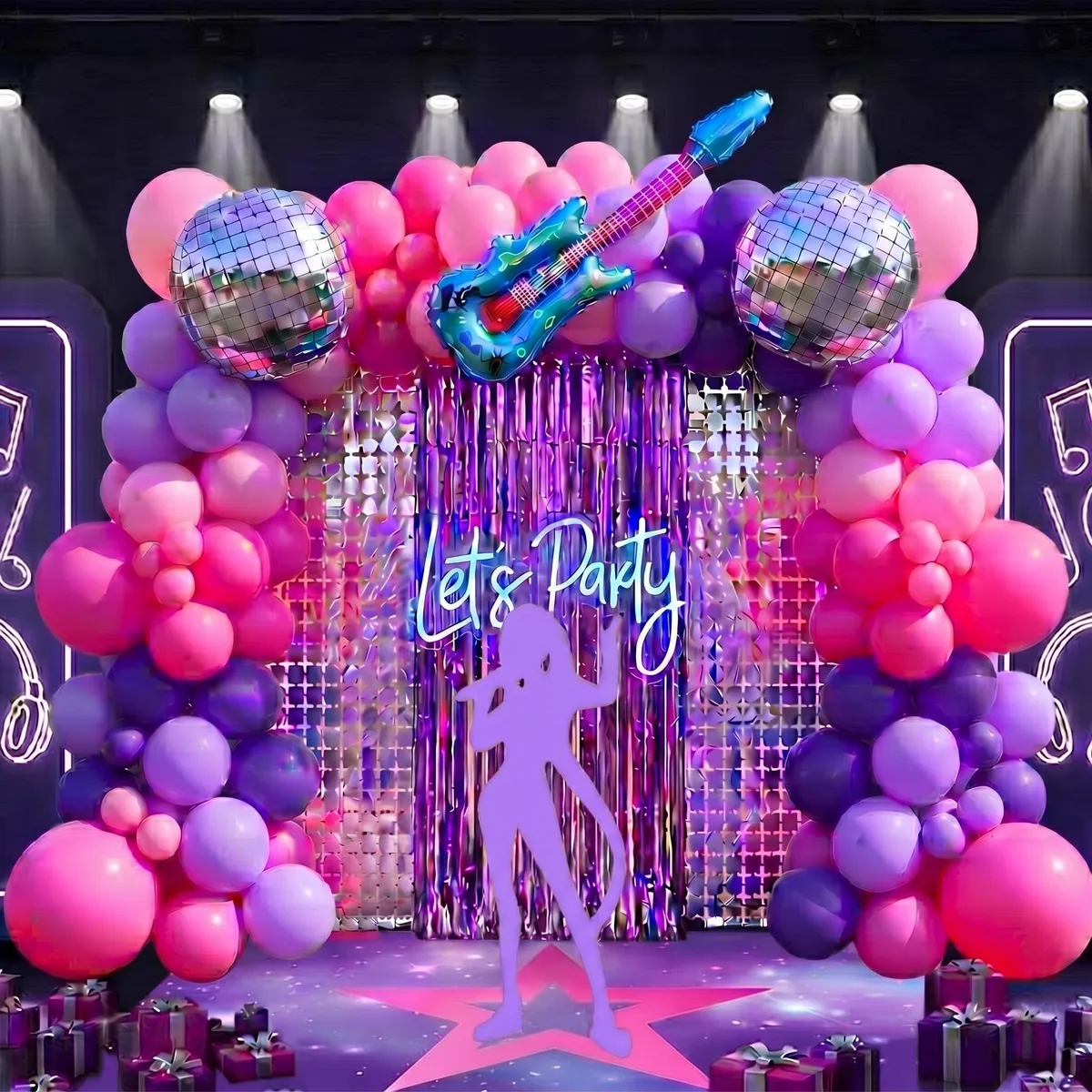 Boxed kit with foil guitar balloon, disco ball balloon, 142 pink and purple latex balloons, red fringe curtains