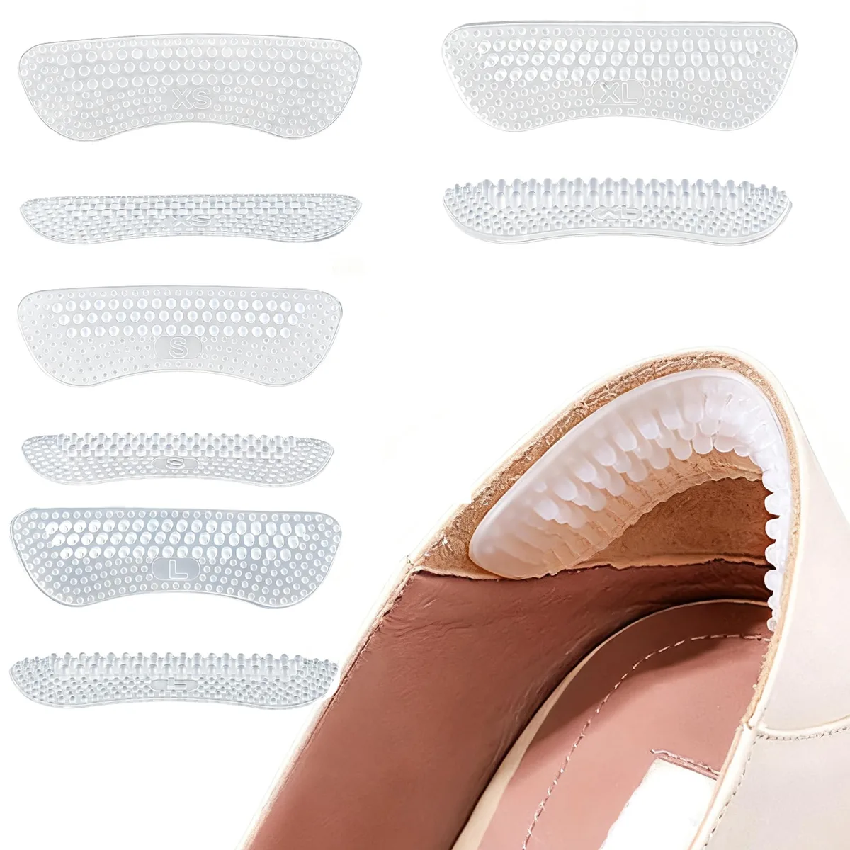 Four pairs of black silicone heel cushions in varying thicknesses