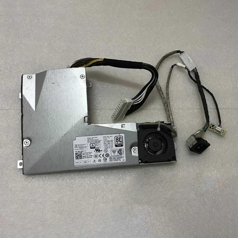 Rectangular silver server power supply unit with ventilation grilles and rear connector panel