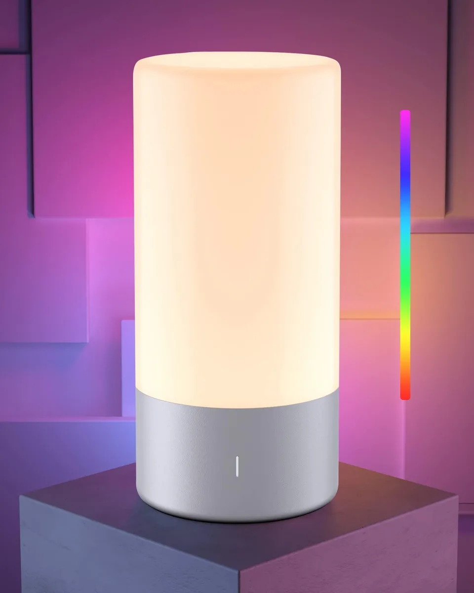 Silver cylindrical table lamp with rounded top, touch base, 21 cm tall