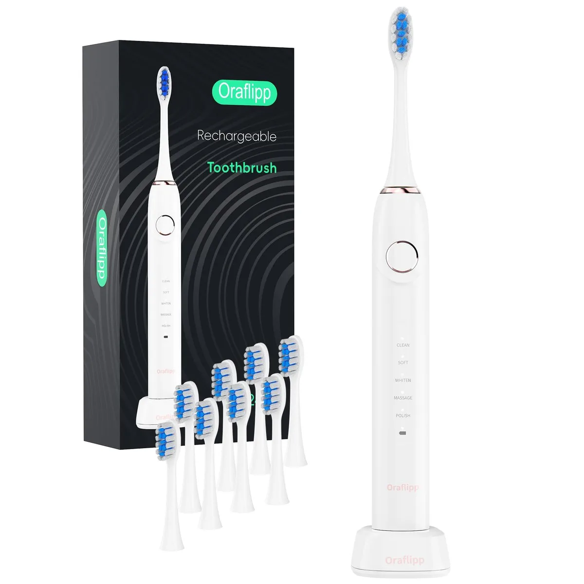 White sonic toothbrush handle with inductive charging base and multiple brush heads