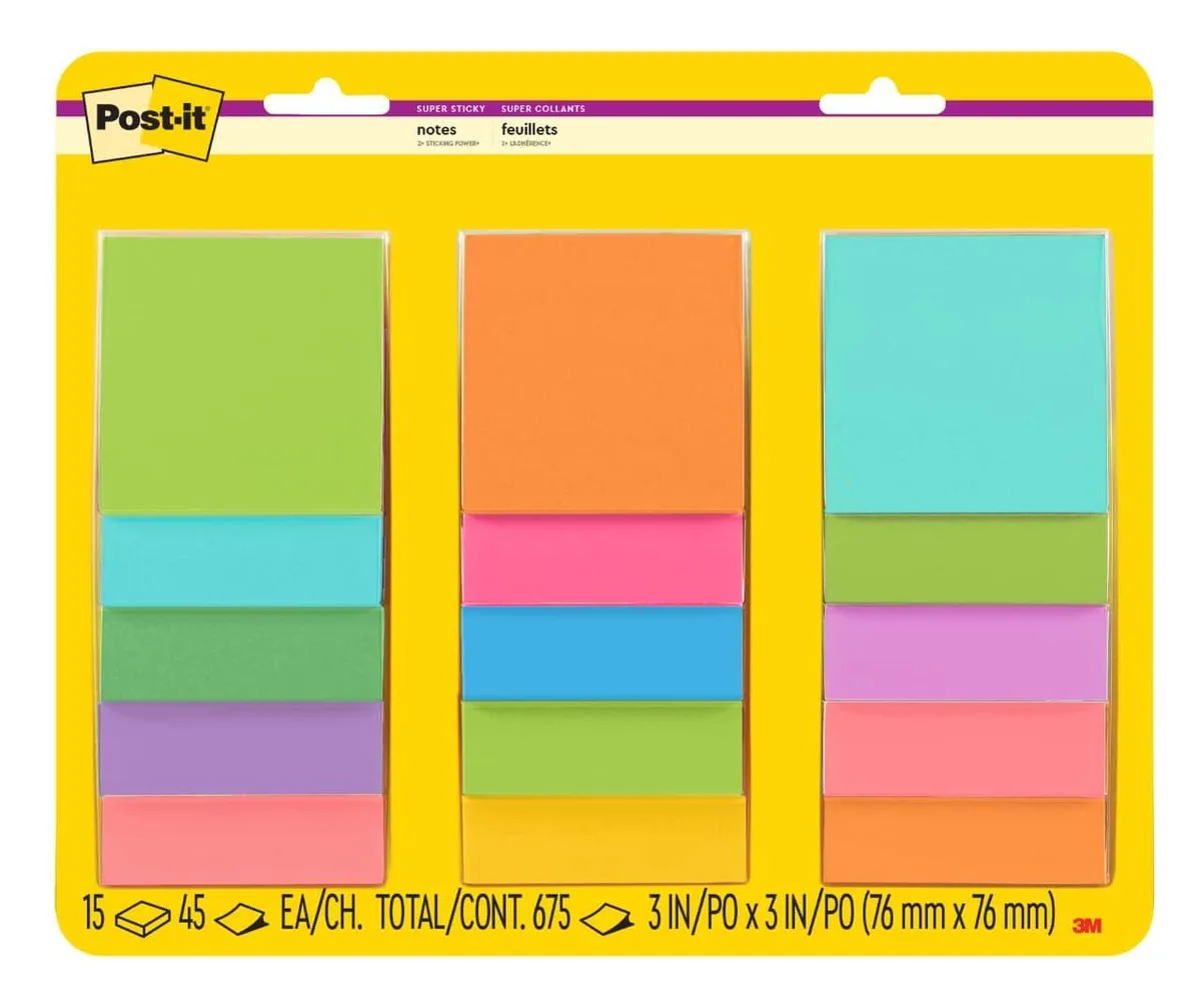 A cardboard box holding fifteen square pads of bright neon sticky notes, each pad three inches by three inches