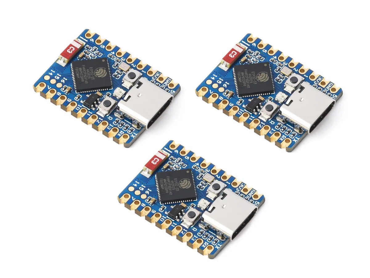 Three small green circuit boards with castellated edges and pin headers
