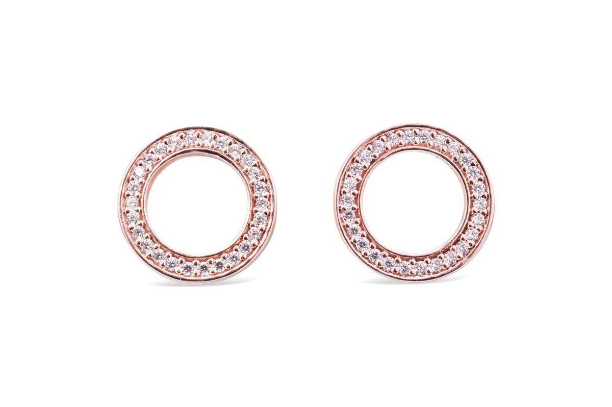 Pair of round stud earrings with rose gold plating and clear cubic zirconia