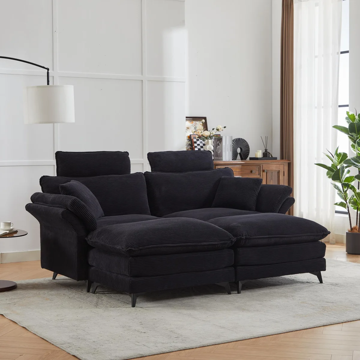 Black corduroy deep-seat sectional with two ottomans, modular L-shape configuration, 85.8 inches wide