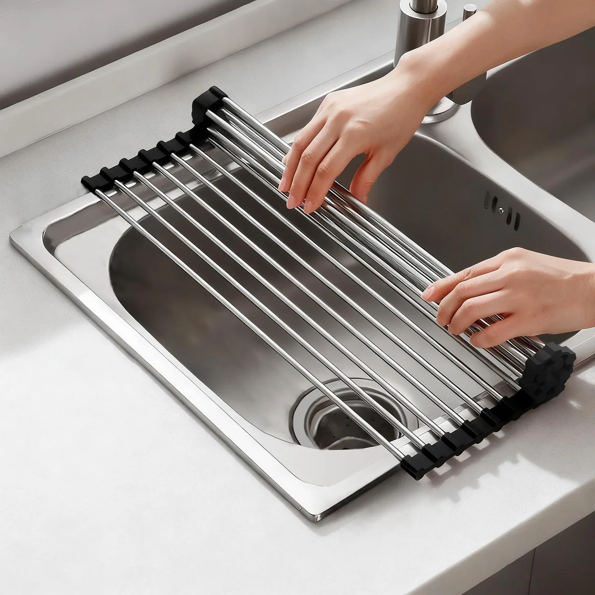 Black roll-up drying rack with stainless steel rods and silicone coating, 17.5 by 11.8 inches
