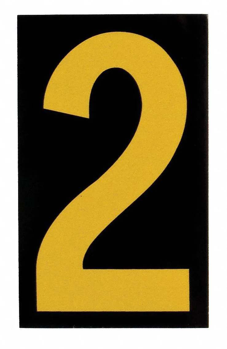 Pack of 25 black reflective number 2 labels on yellow background
