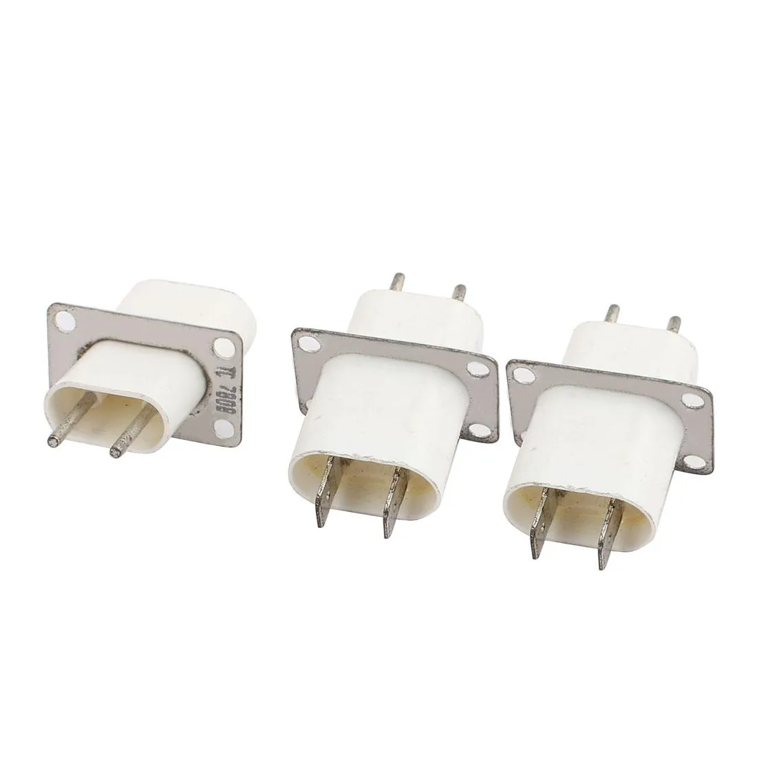 Three small rectangular magnetron connectors with metal pins, light colour finish