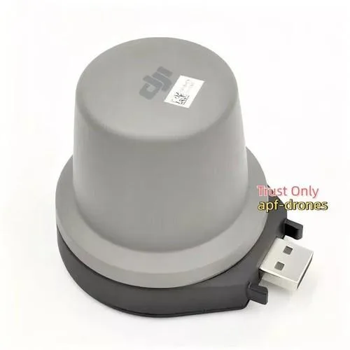 Small grey rectangular dongle with connector end