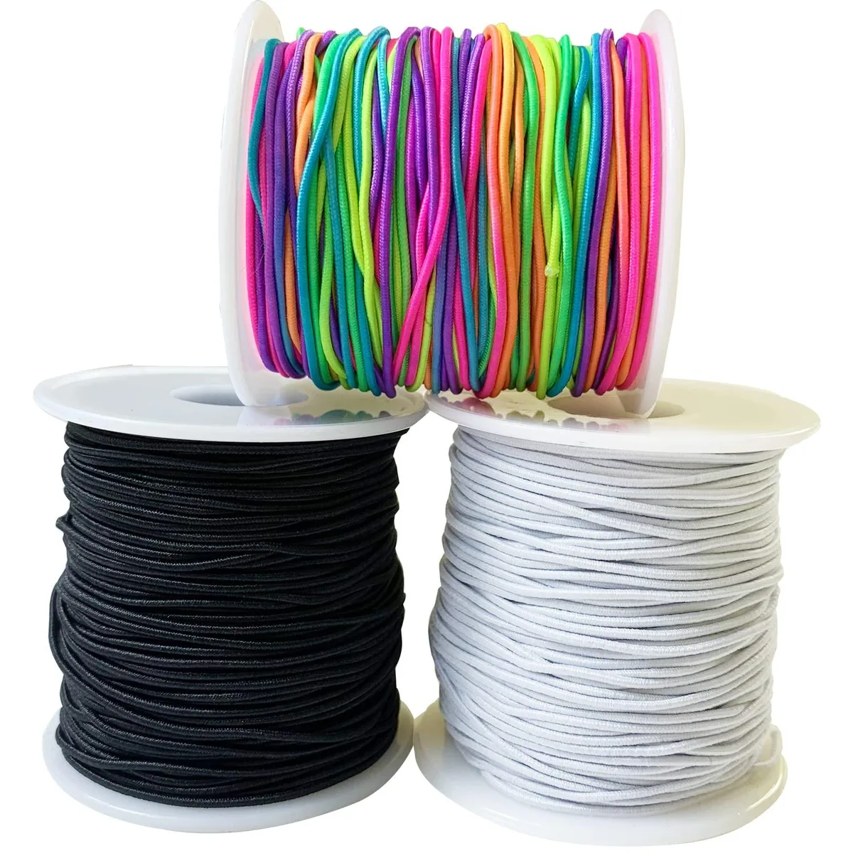 Three spools of 1.2mm round elastic cord in black, white and rainbow, 60 metres each