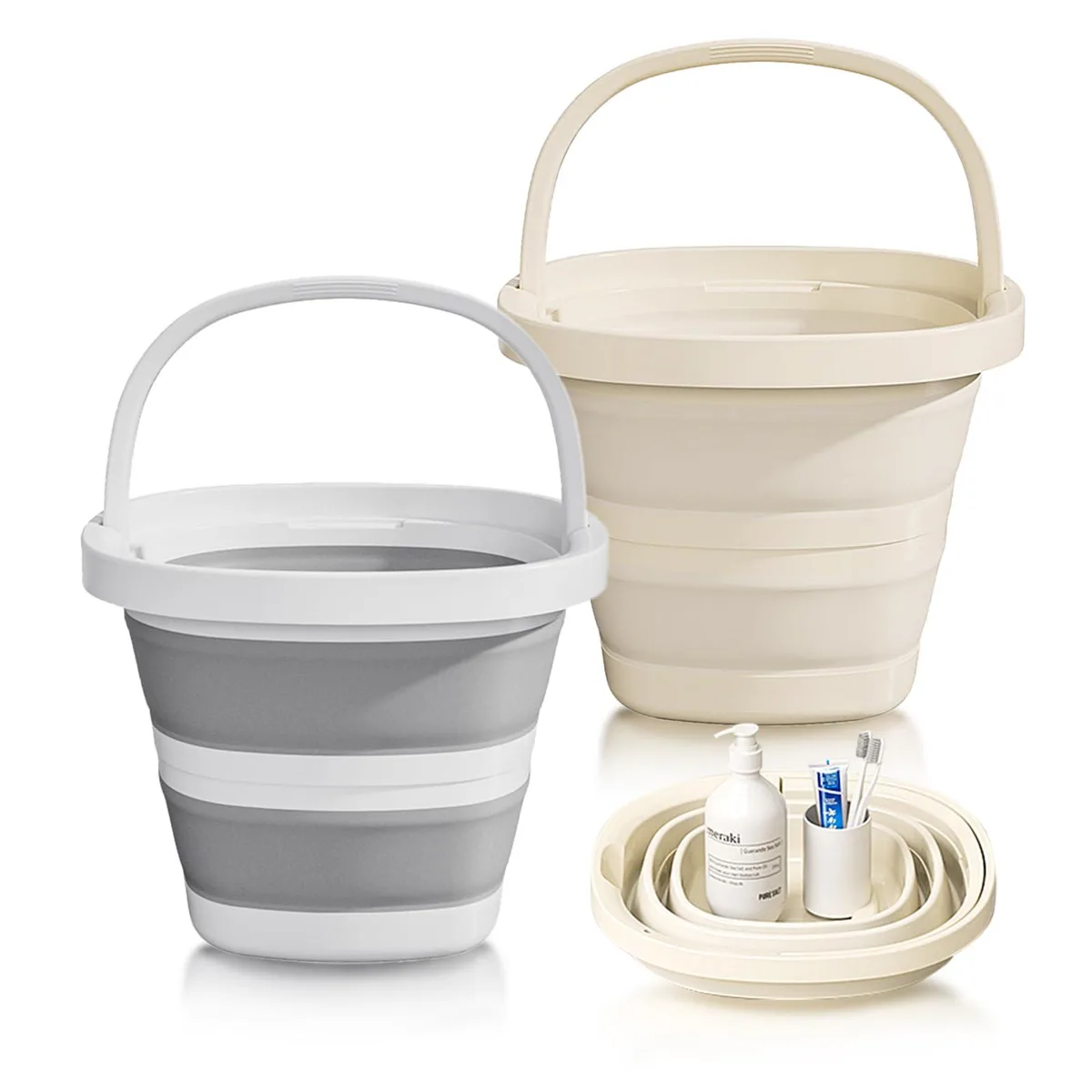 Two silver rectangular collapsible buckets folded flat with handles visible