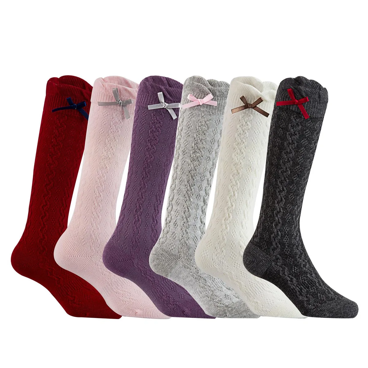 Six pairs of colourful knee-high cotton socks with ribbed cuffs and grip dots on soles
