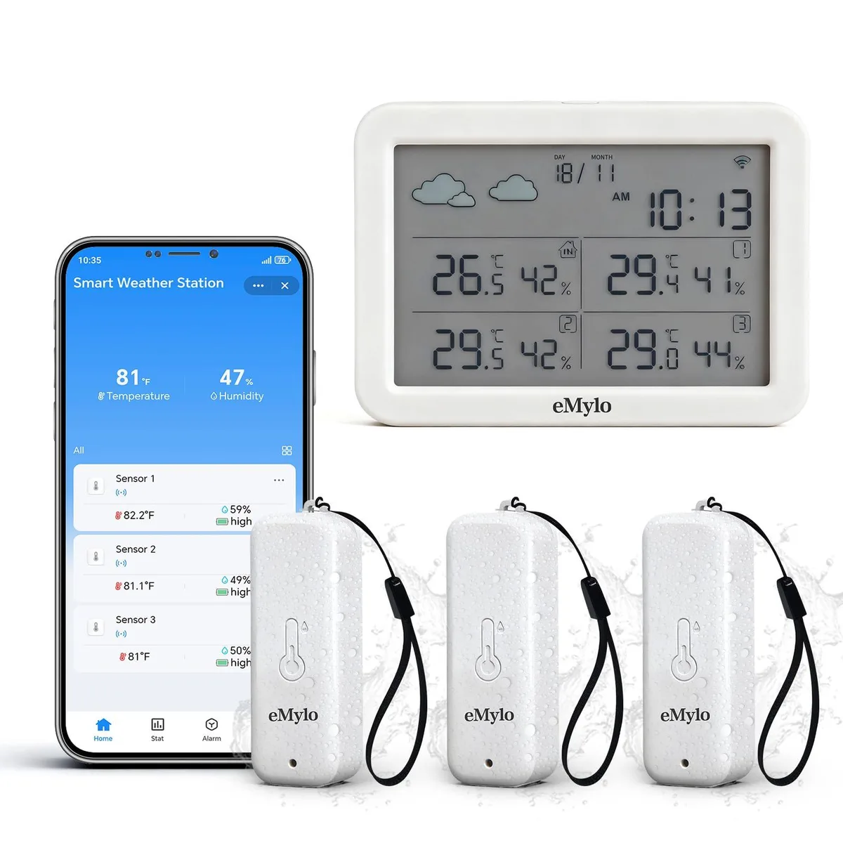 Black rectangular gateway with three small white wireless sensors