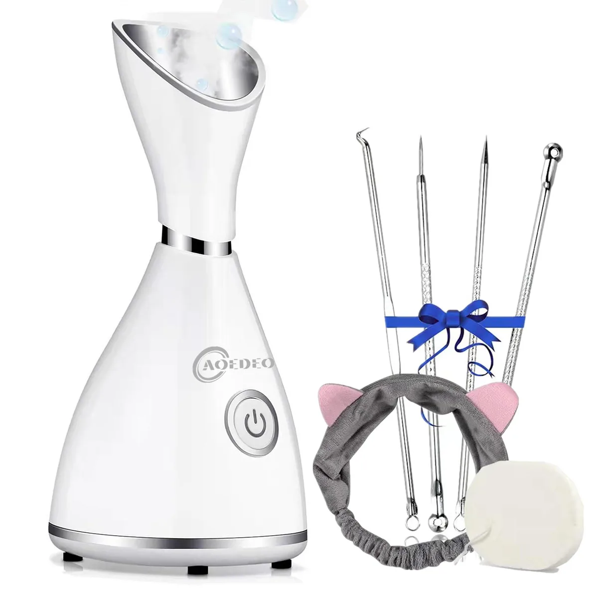 White compact facial steamer with water reservoir and included stainless steel tool kit