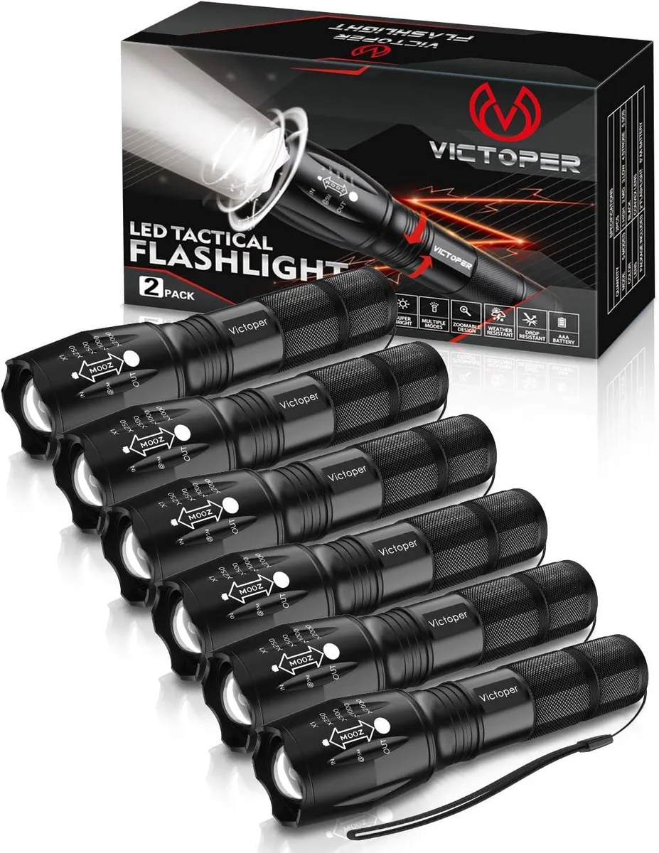 Six silver cylindrical flashlights with textured grip and zoomable heads