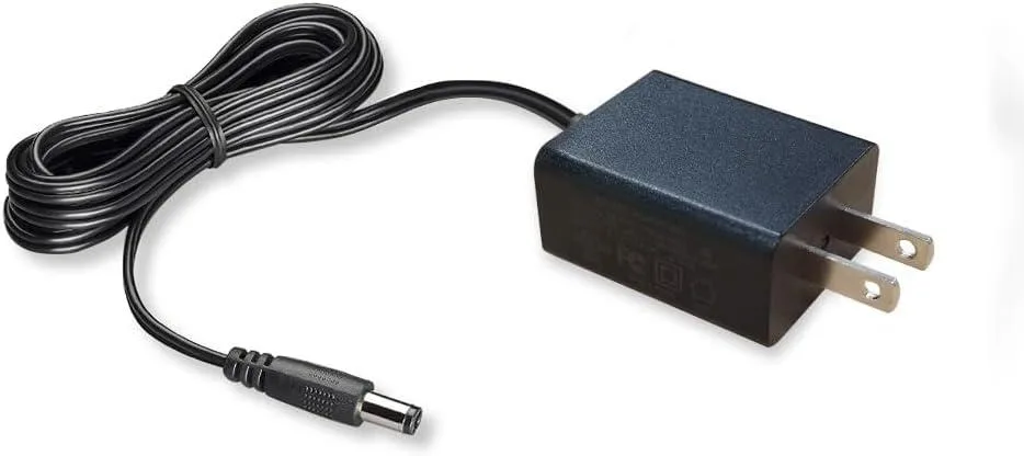 Compact white AC adapter with detachable power cord