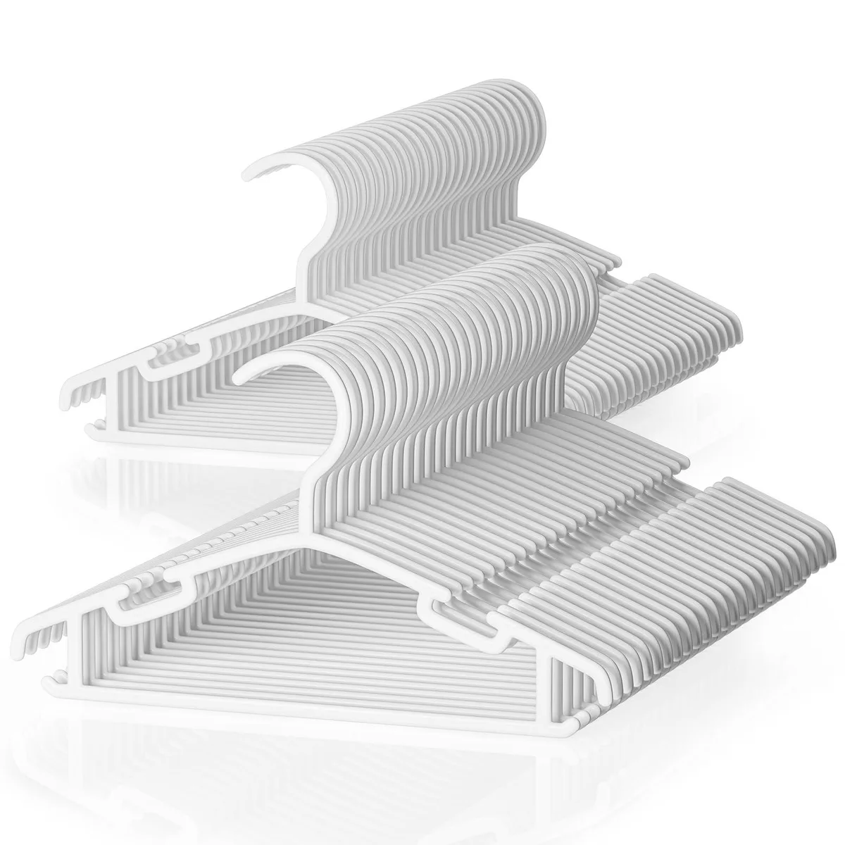 Fifty white plastic child hangers with notched shoulders