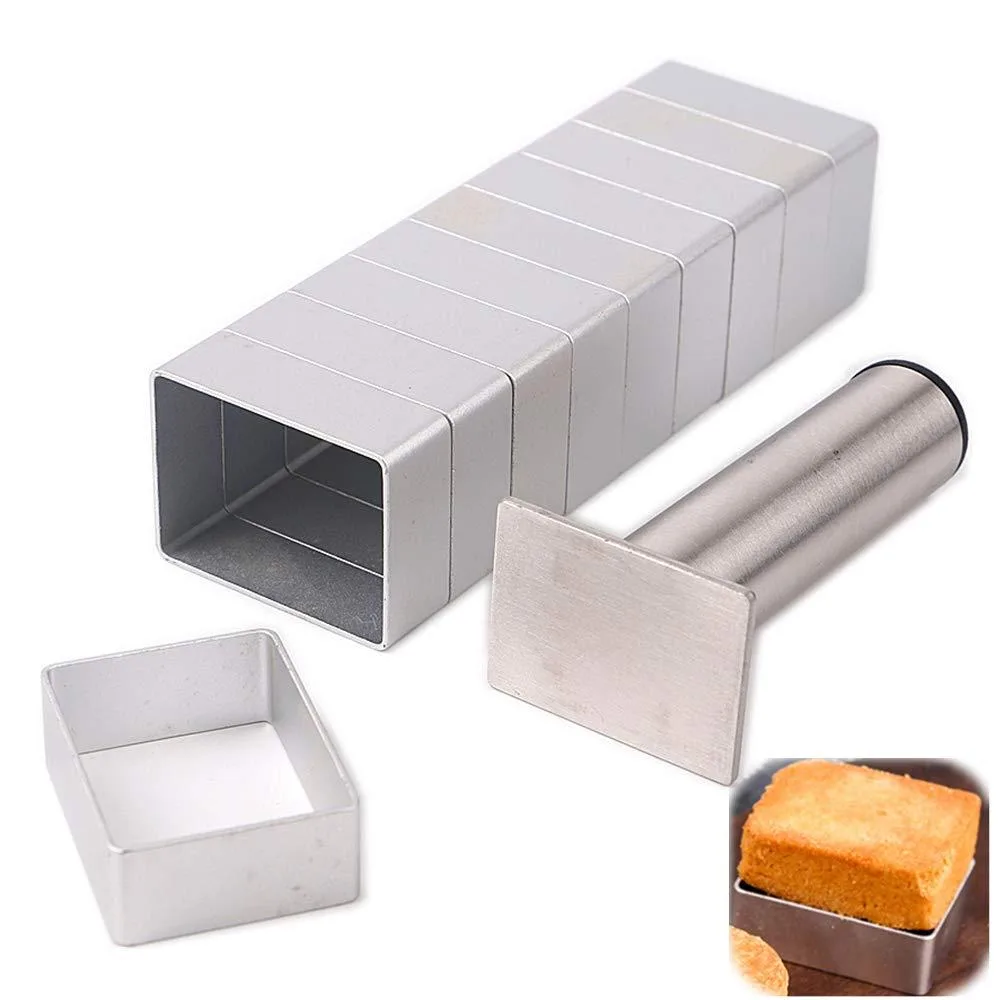 Ten rectangular aluminium pineapple biscuit moulds with a press stamp