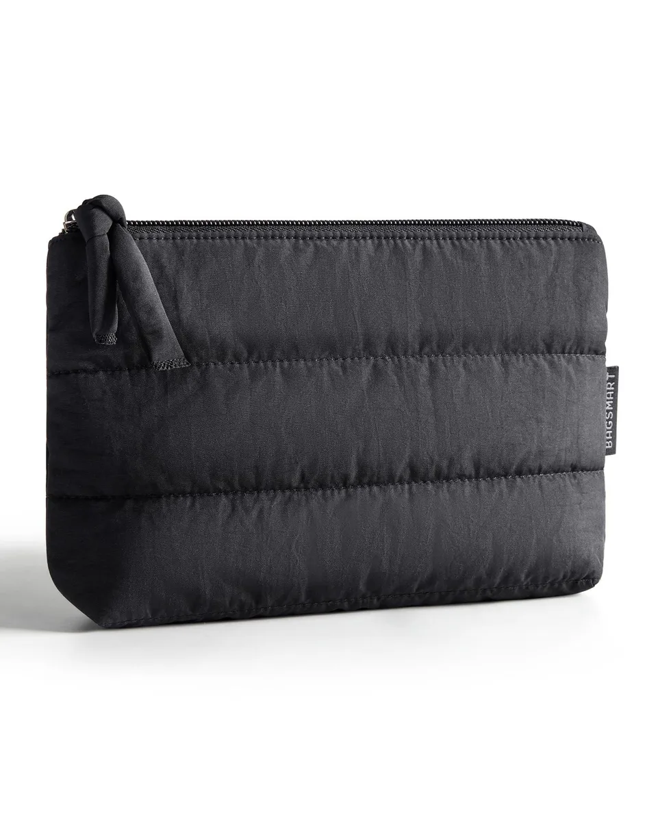 Black puffy polyester makeup bag 15 inches wide with quilted texture and zipper pull