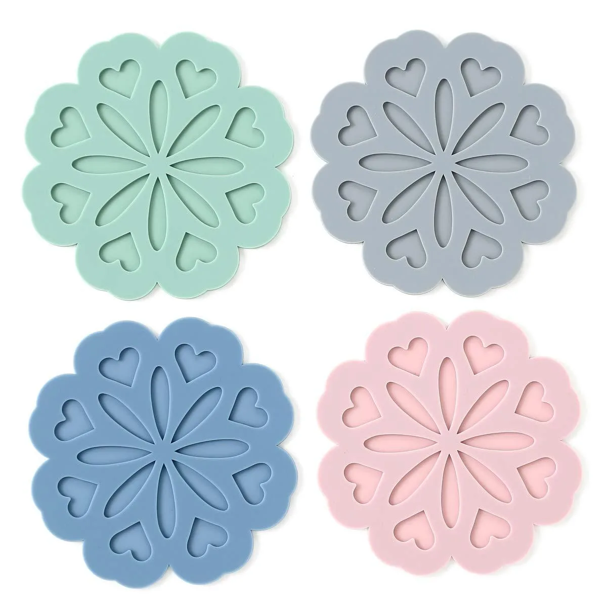 Four round silicone trivet mats in assorted colours, textured surface, flexible heat-resistant material