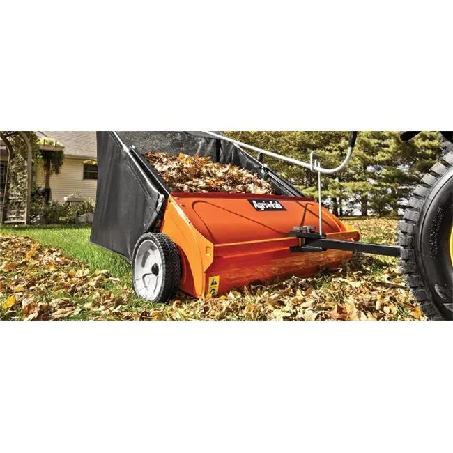 Black steel frame tow lawn sweeper with 44 inch brush width, 25 cu ft polyester hopper and semi pneumatic wheels
